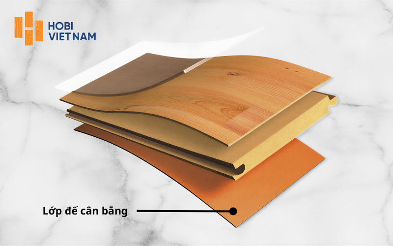 Lớp cân bằng giúp ổn định ván sàn, hạn chế ẩm ngược và cong vênh