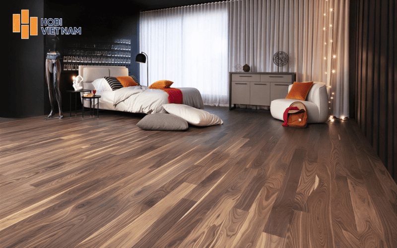 Vân gỗ óc chó đậm nét tạo điểm nhấn sang trọng cho không gian nghỉ ngơi
