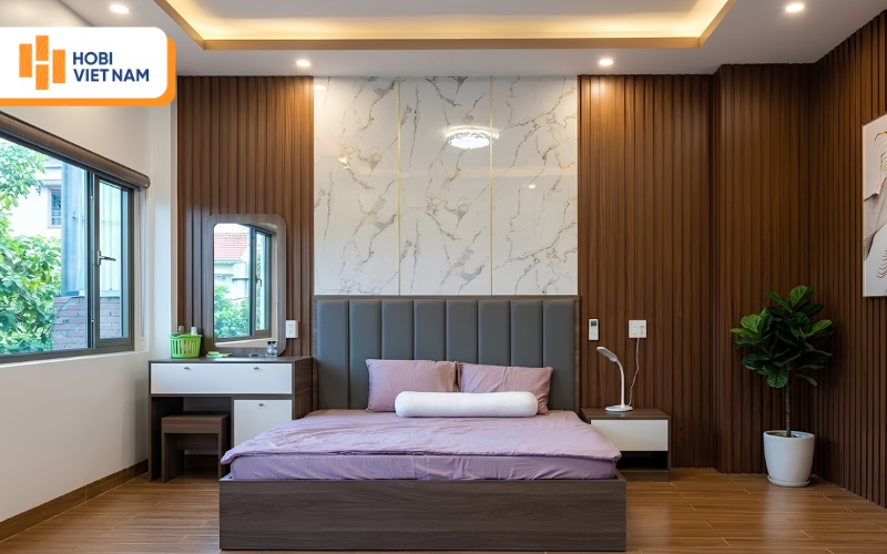 Phòng ngủ hiện đại với vách trang trí lam sóng và đá marble sang trọng