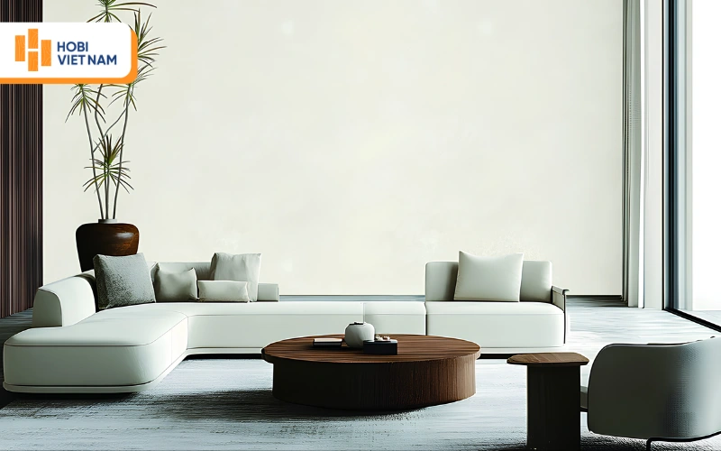 Phòng khách hiện đại với giấy dán tường trắng và sofa góc lớn