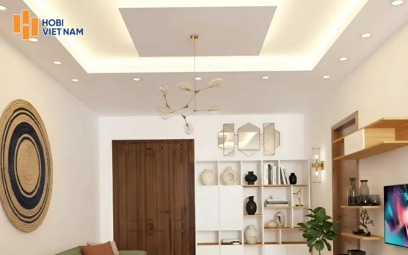 Trần thạch cao phòng khách giật cấp trung tâm với đèn chùm thả nghệ thuật Trần thạch cao phòng khách giật cấp trung tâm với đèn chùm thả nghệ thuật
