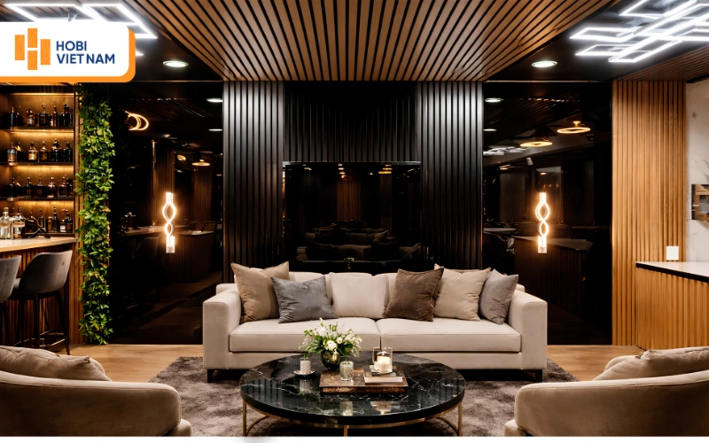 Ốp mảng tường vách sofa bằng tấm than tre tráng gương đen phối lam gỗ ấm cúng 